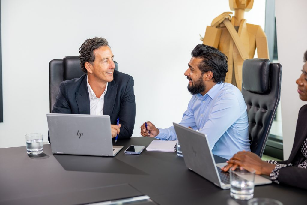 Two men on laptops at the Brisbane Business Bub